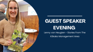 Guest speaker Lenny van Heugten holding Stories from the Kokako Management Area book.